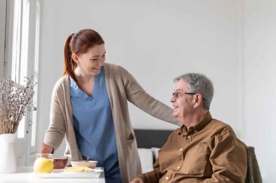 Social Care Worker with an old man